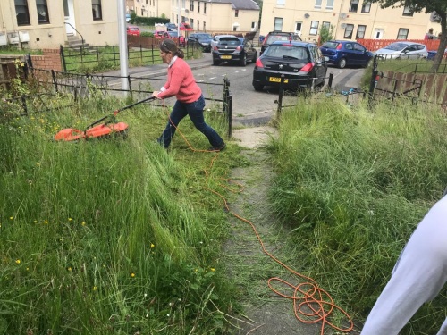 One of our young people polishing up on their gardening skills